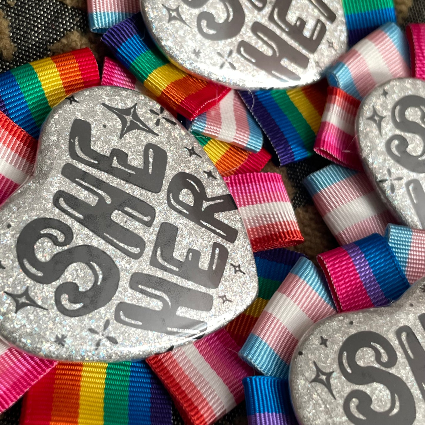 She/Her Rosette Heart Pin
