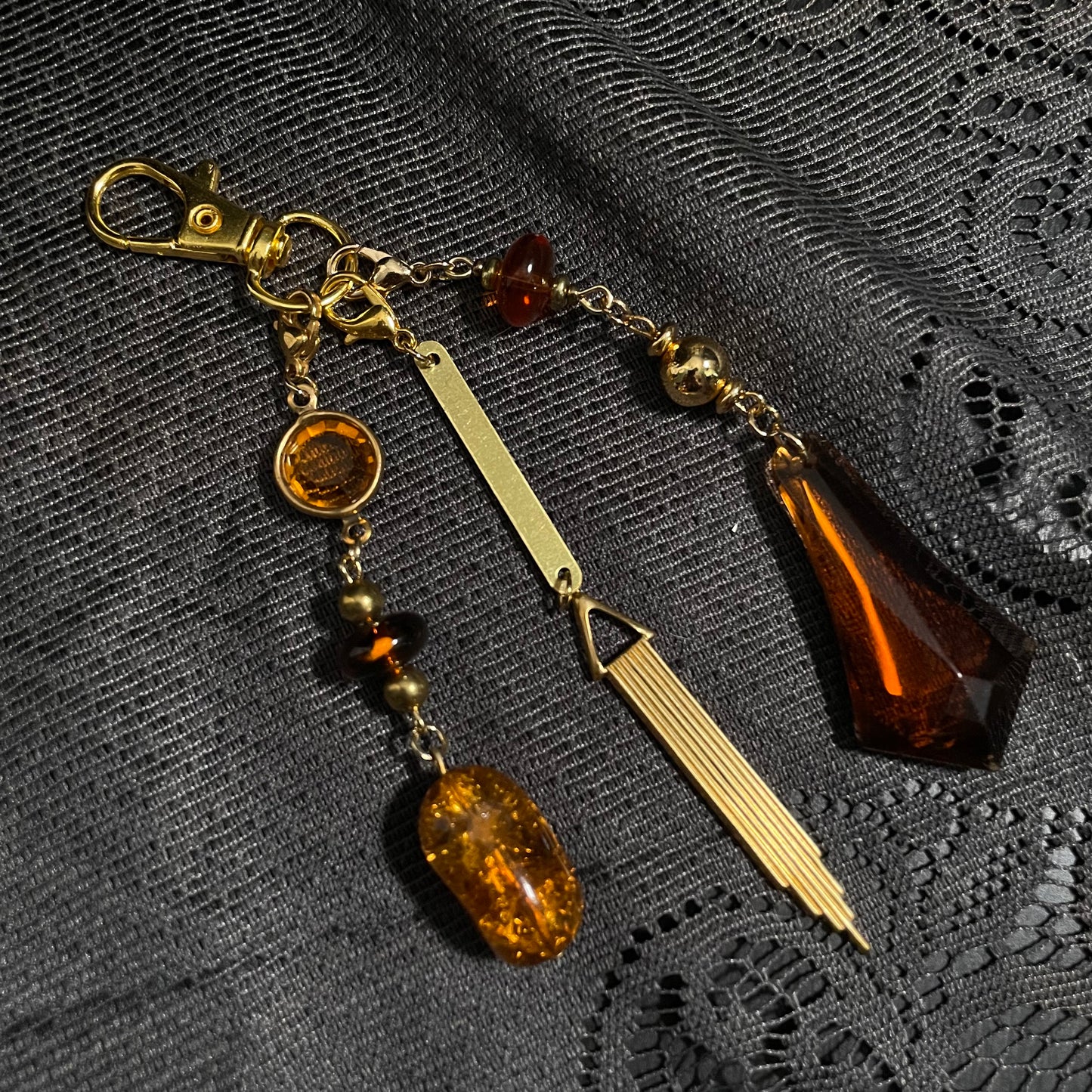 Amber & goldtone bag charm