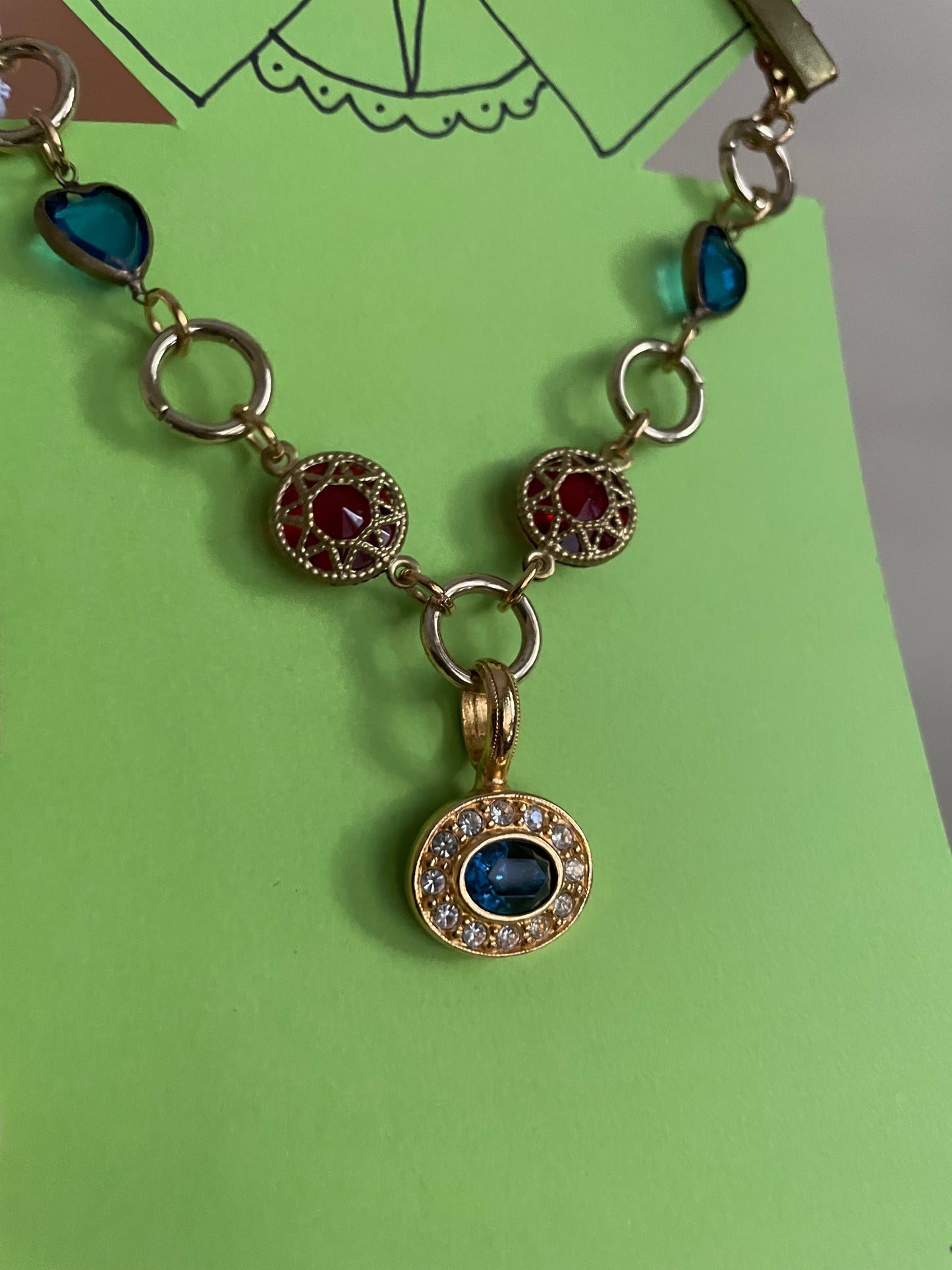 Blue & red goldtone clip chain