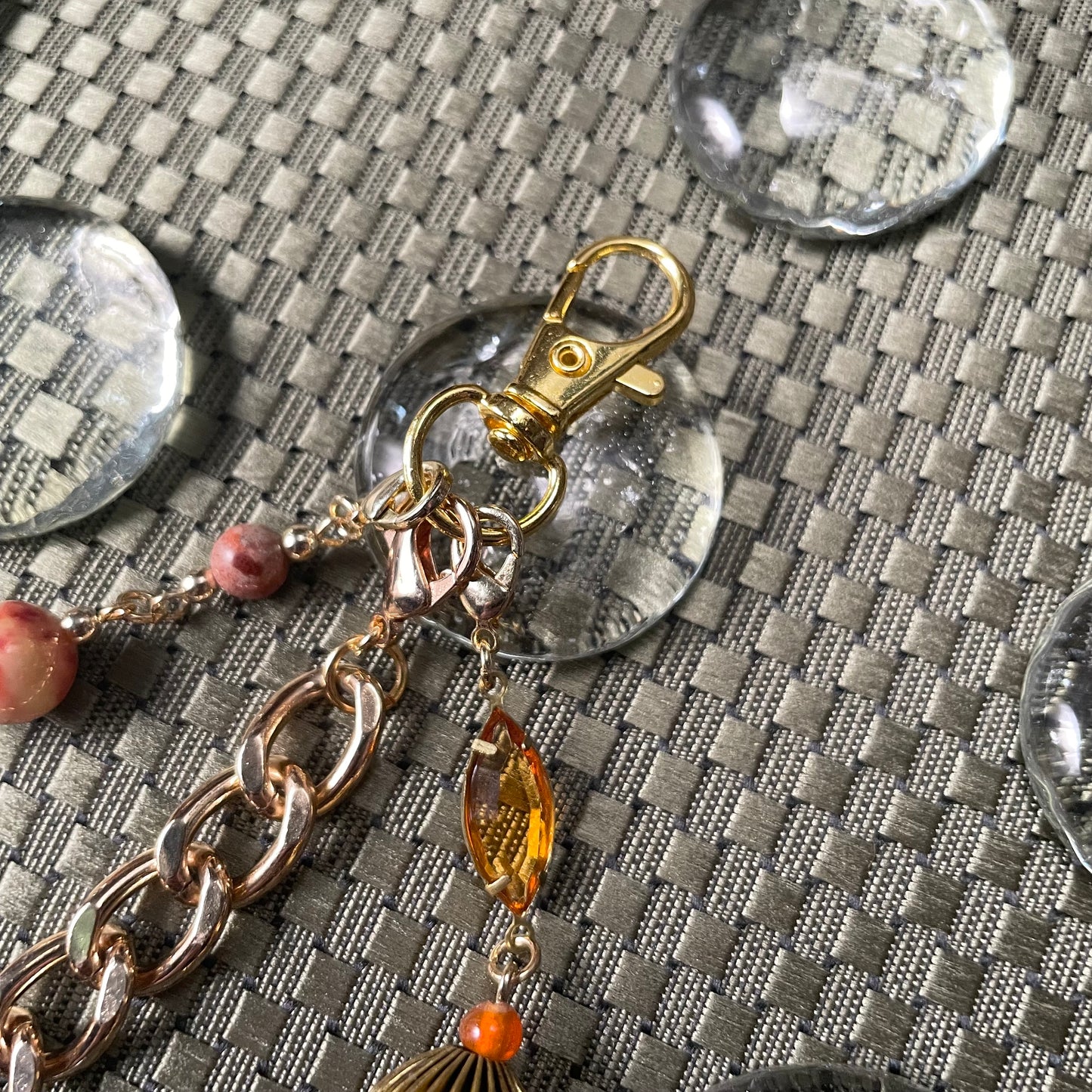 Leo goldtone bag charm