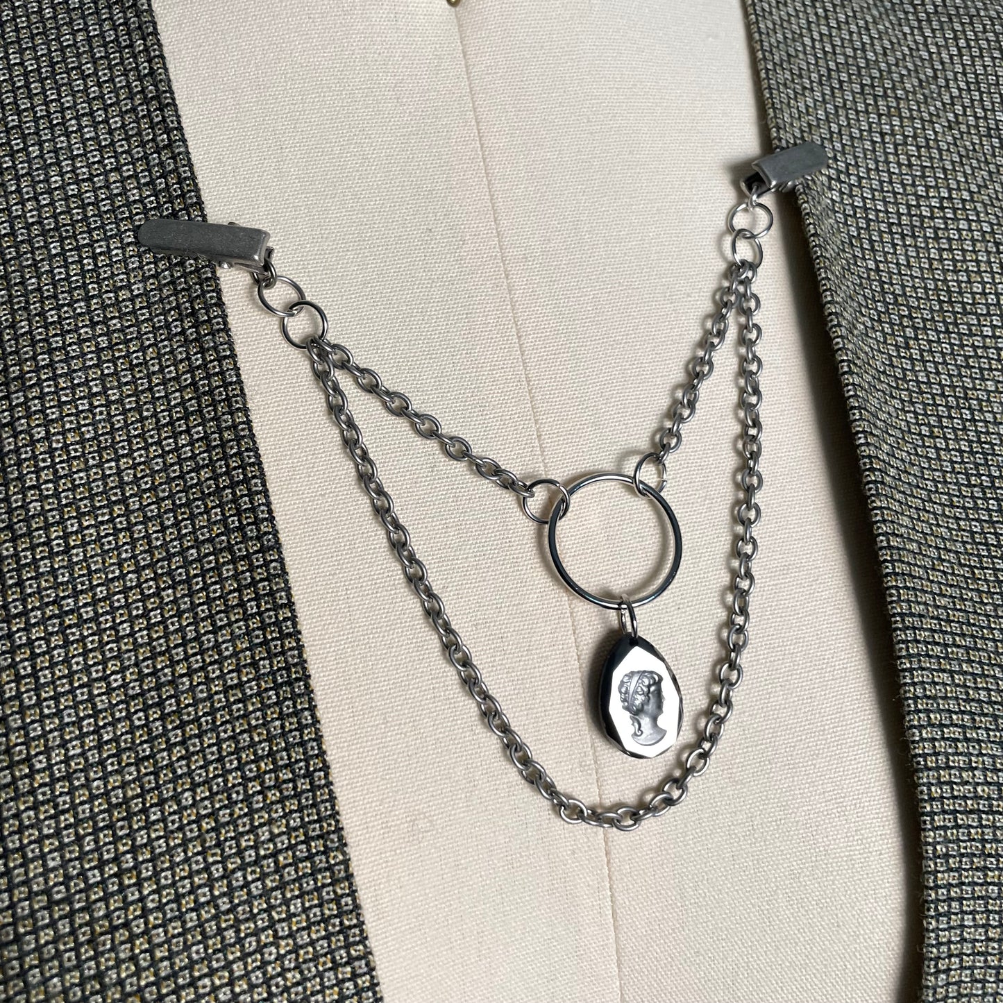 Silver tone cameo collar clip