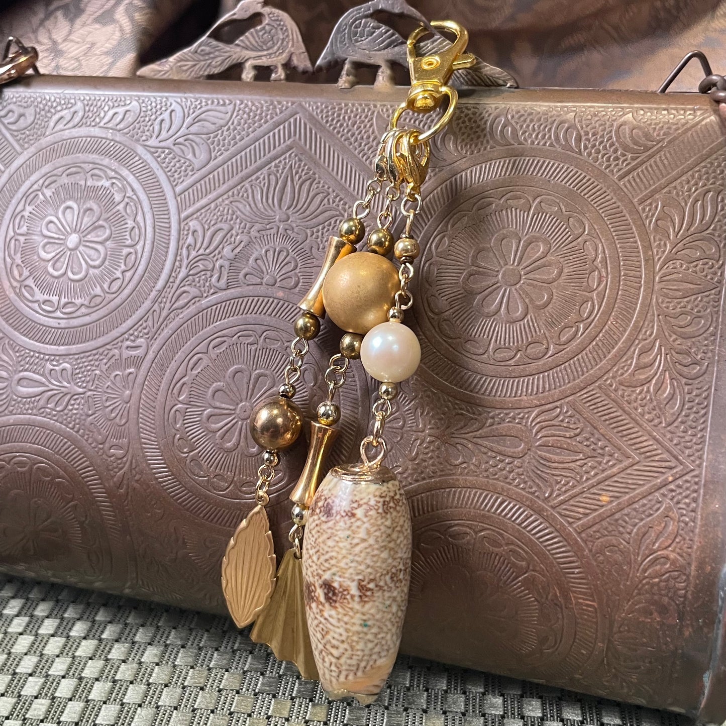 Gold shell bag charm