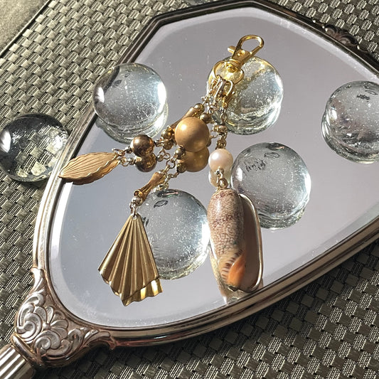 Gold shell bag charm