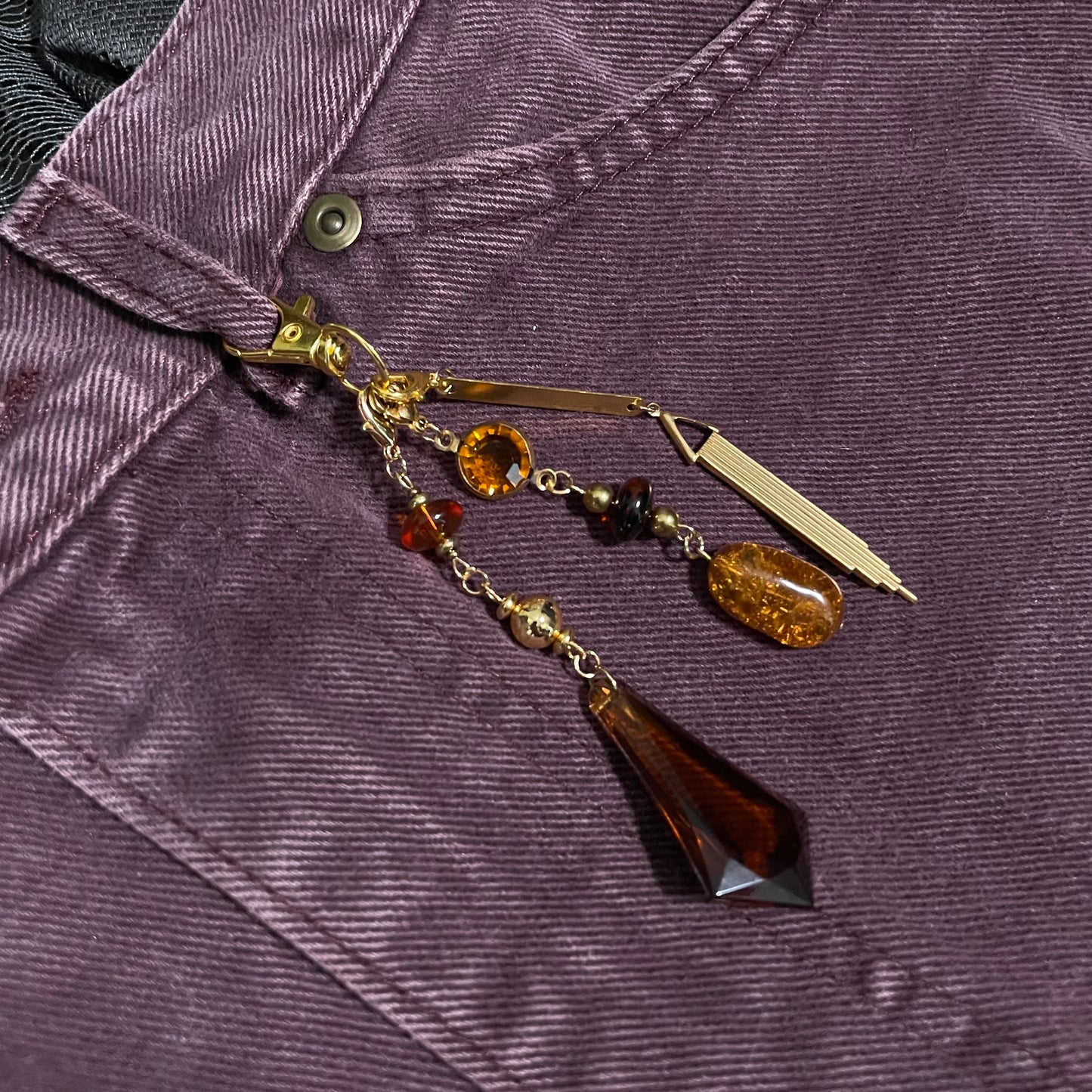 Amber & goldtone bag charm